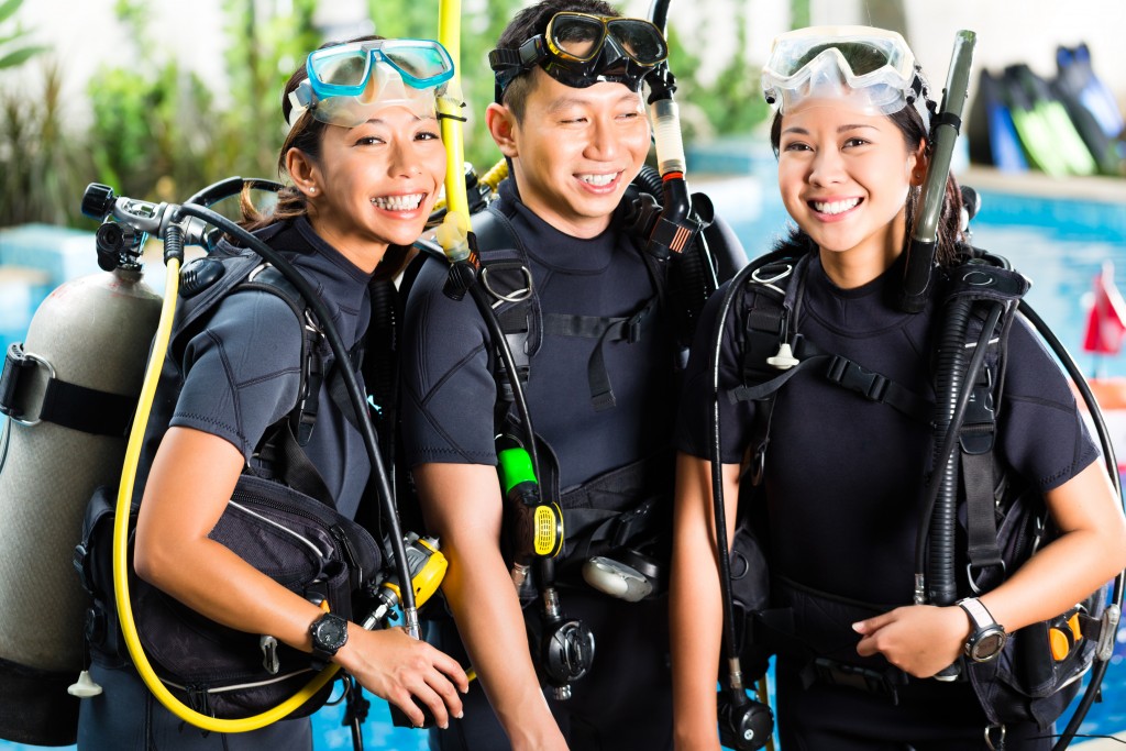 http://www.dreamstime.com/stock-image-people-diving-school-students-master-asian-diver-course-holiday-wetsuit-oxygen-tank-image32787701